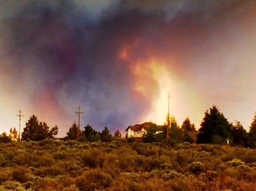 Taken about two blocks from my house.  The yellow isn't flames - its a break in the smoke and the sun coming through.