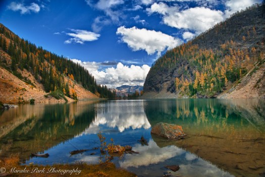 View from the opposite side of the lake in the autumn.